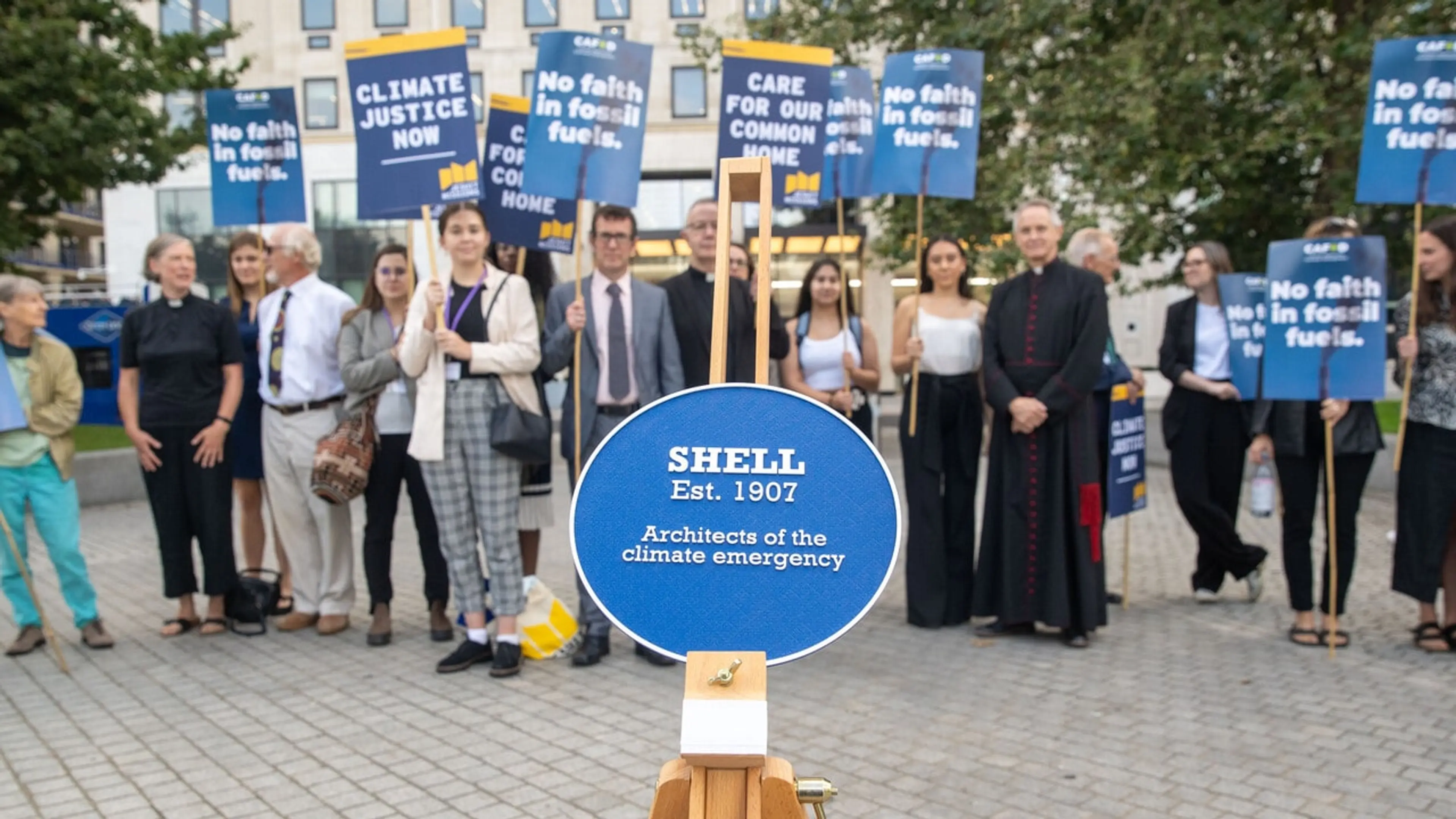 UK - Westminster - Fossil fuel companies presented with climate blue plaques