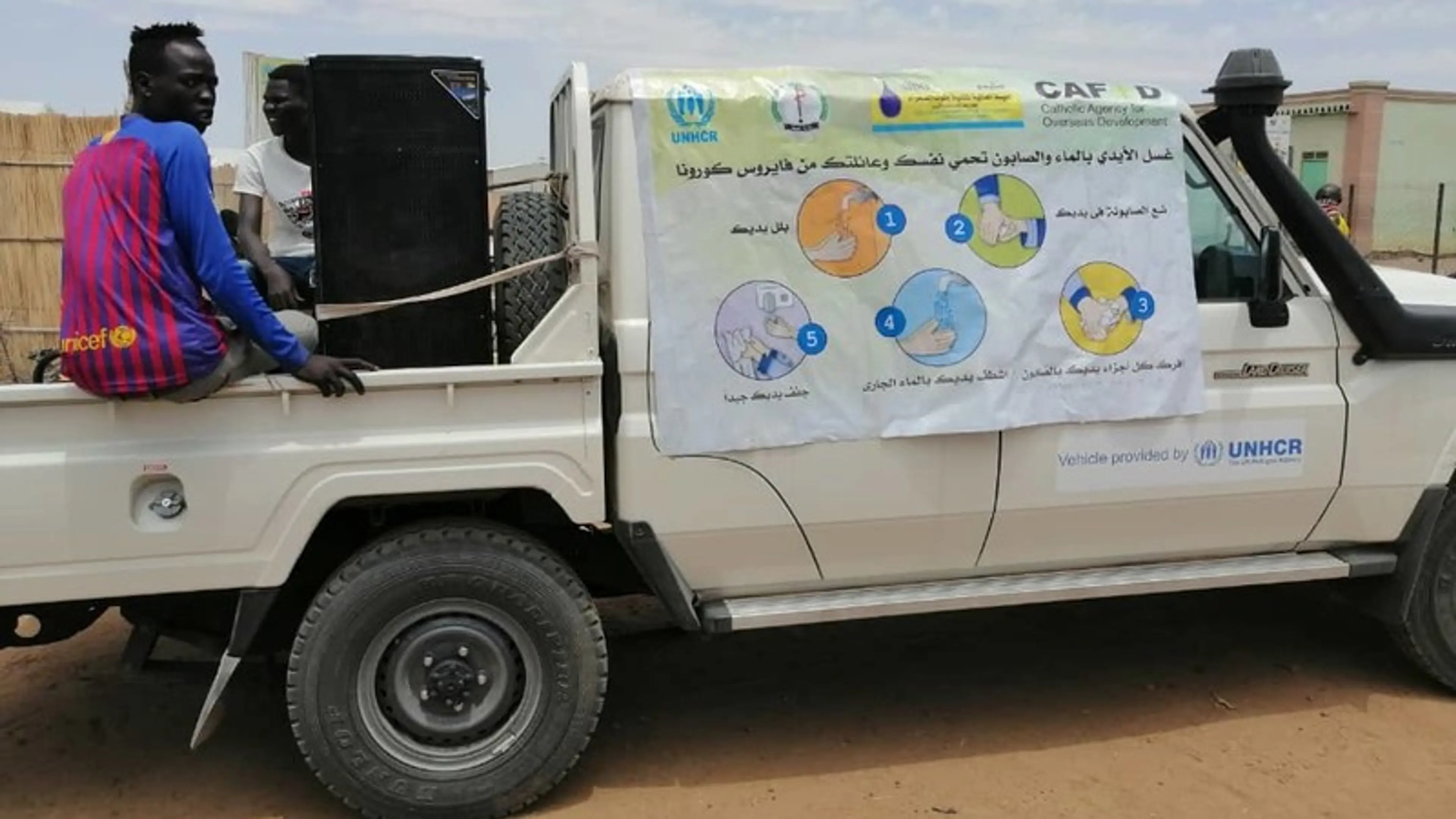 Africa - Sudan - coronavirus covid prevention information on side of truck