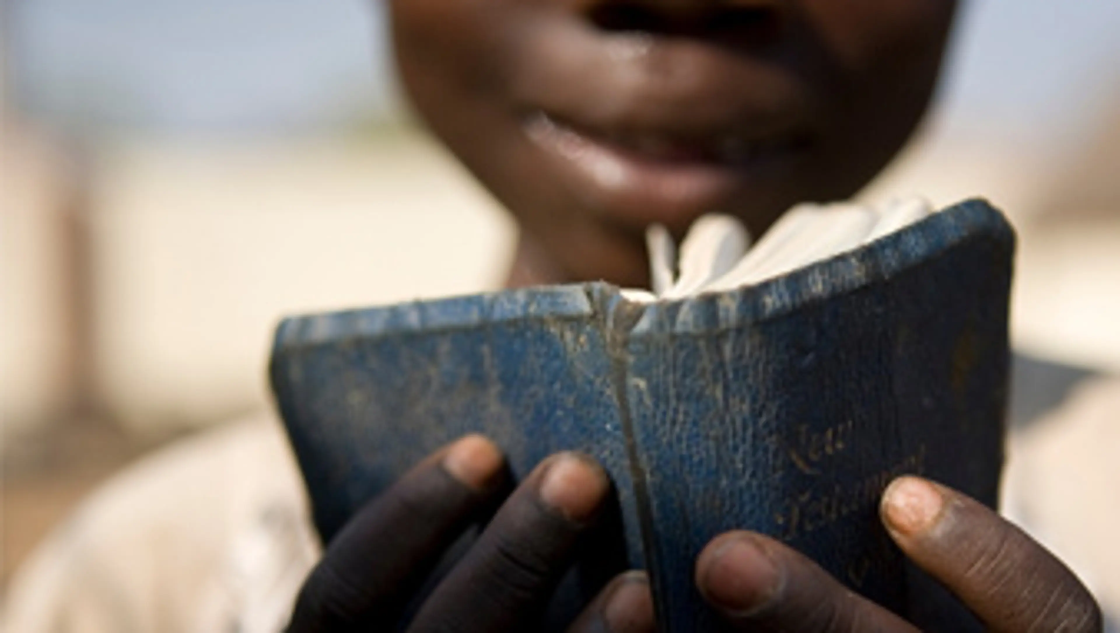 Nigeria - Boy reading bible